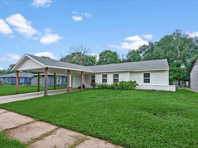 single story home with a carport and a front lawn