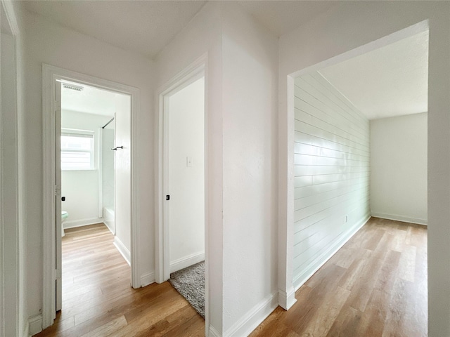 hallway featuring light hardwood / wood-style flooring