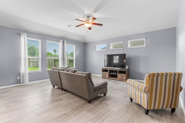 living room featuring ceiling fan