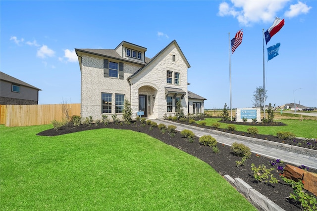 view of front of house with a front lawn