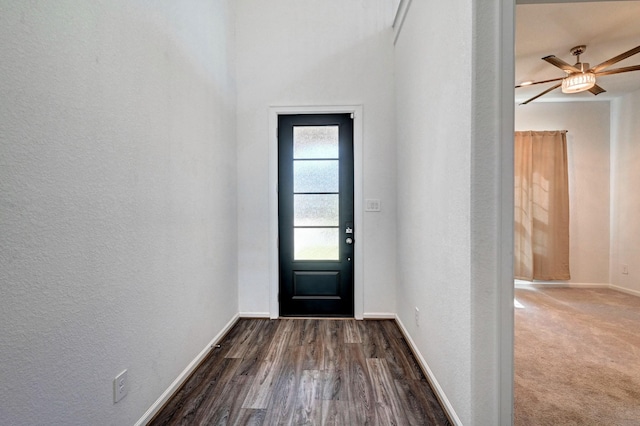 entryway featuring dark hardwood / wood-style flooring and ceiling fan