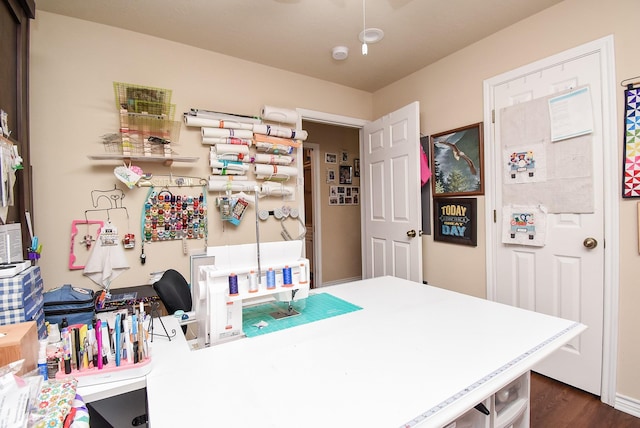 office space with dark wood-type flooring