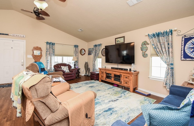 living room featuring ceiling fan, dark hardwood / wood-style floors, and lofted ceiling