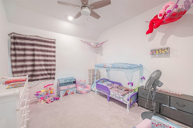 playroom featuring carpet floors, vaulted ceiling, and ceiling fan