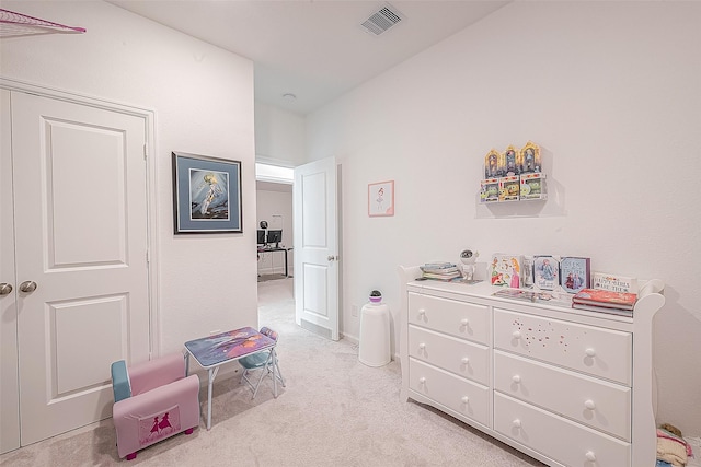 bedroom with light carpet