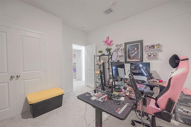 office area featuring light colored carpet