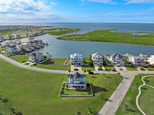 bird's eye view featuring a residential view and a water view