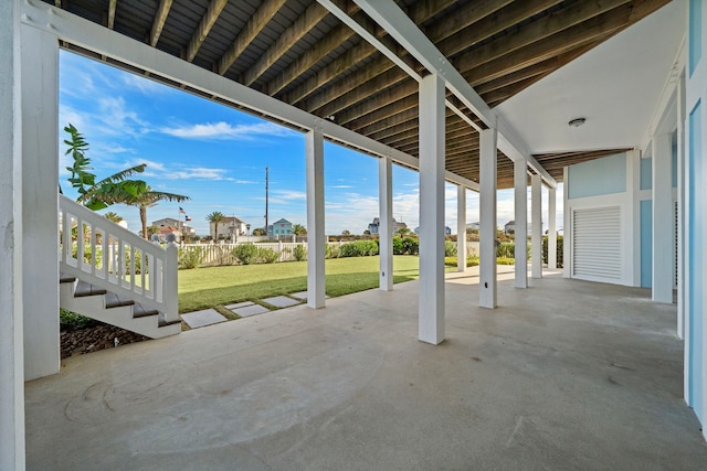 view of patio featuring fence