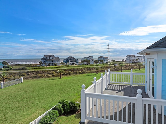 view of yard featuring a deck with water view