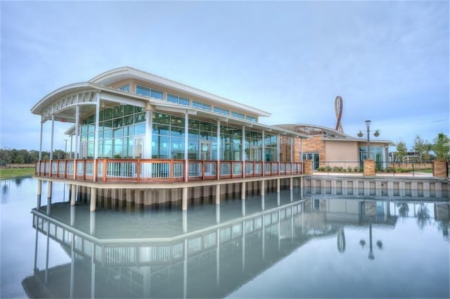 view of pool with a water view