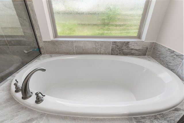 bathroom with plenty of natural light