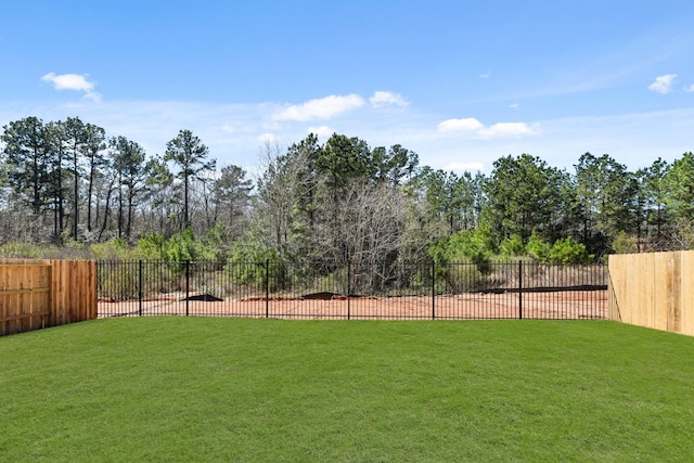 view of yard with fence