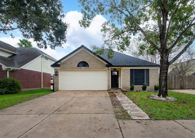 ranch-style house featuring a garage