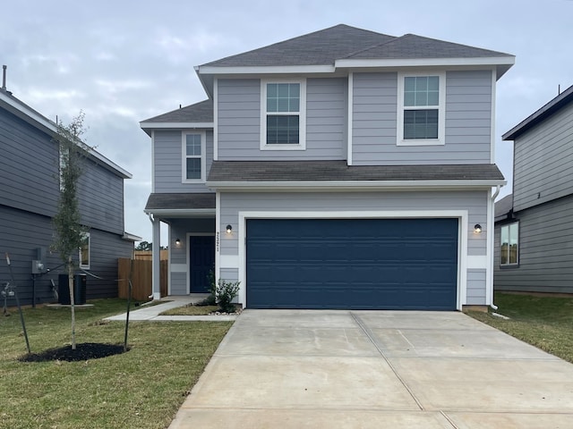 front facade featuring central AC unit, a garage, and a front lawn