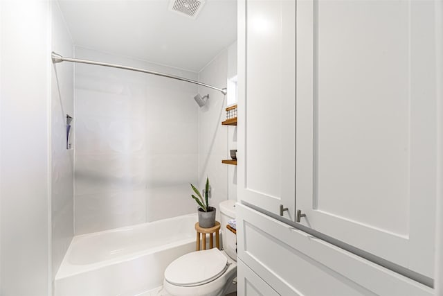 bathroom featuring shower / bathing tub combination and toilet