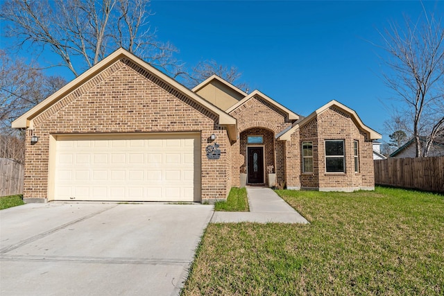 front facade featuring a front lawn and a garage