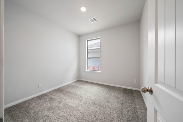 spare room with carpet flooring