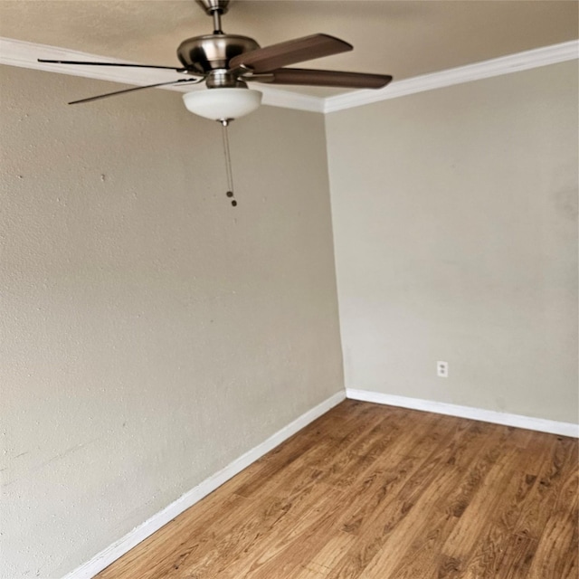 unfurnished room featuring ceiling fan, crown molding, and hardwood / wood-style flooring