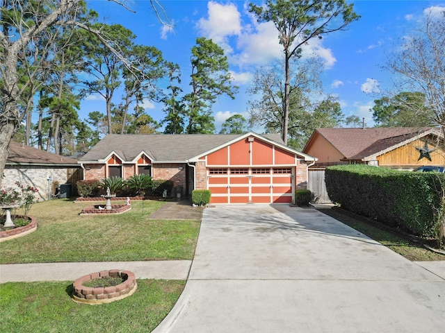 single story home featuring a front yard and a garage