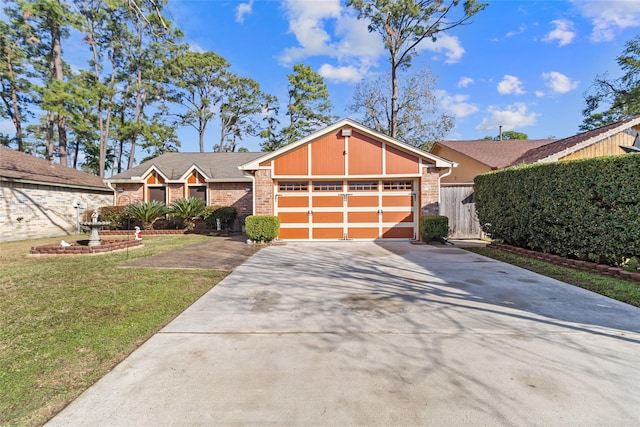 view of front facade featuring a garage and a front lawn