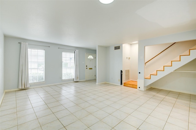 interior space featuring light tile patterned floors