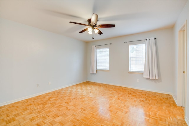 unfurnished room with ceiling fan