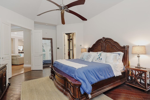 bedroom featuring ceiling fan and dark hardwood / wood-style floors