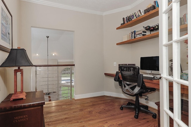 office featuring wood-type flooring and ornamental molding