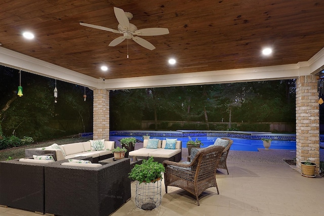 view of patio featuring an outdoor hangout area and ceiling fan