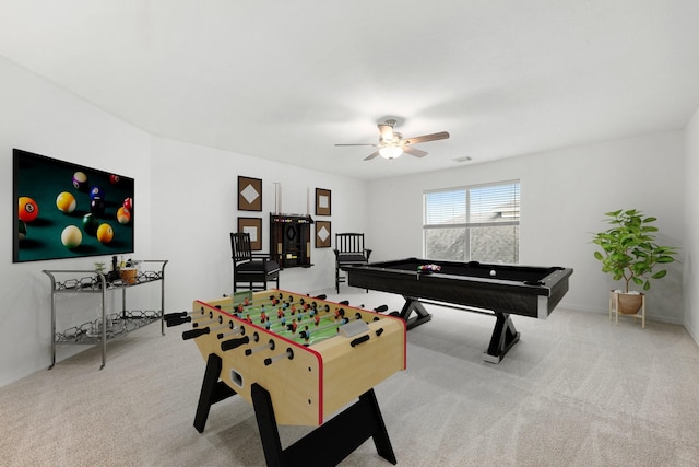 rec room with light carpet, ceiling fan, and pool table