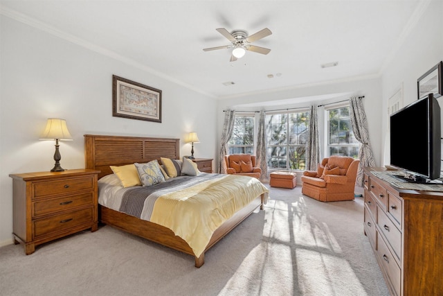 bedroom featuring light carpet, ceiling fan, and ornamental molding