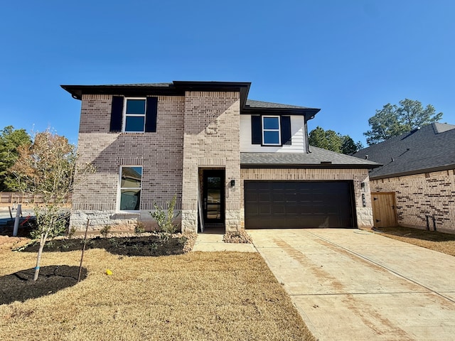 view of front of house with a garage