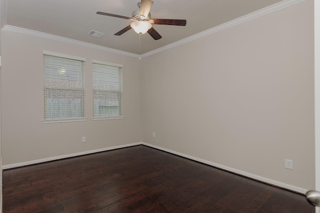 spare room featuring hardwood / wood-style flooring, ceiling fan, and crown molding