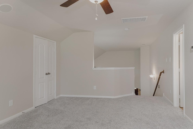 bonus room with light colored carpet, ceiling fan, and lofted ceiling