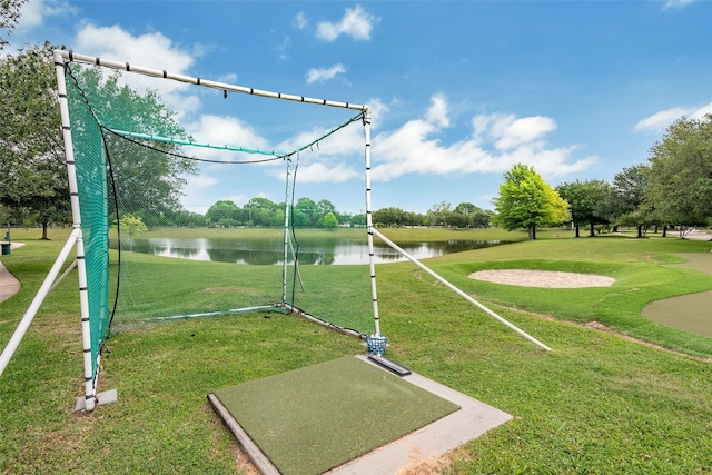 surrounding community featuring a yard and a water view