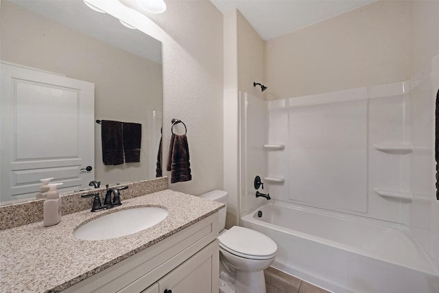 full bathroom with vanity,  shower combination, toilet, and tile patterned flooring