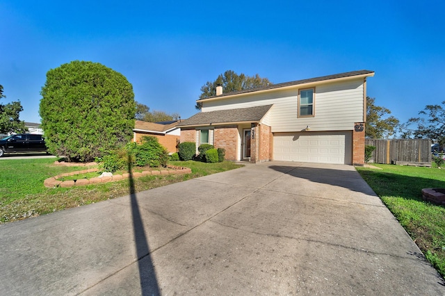 tri-level home with a front yard and a garage