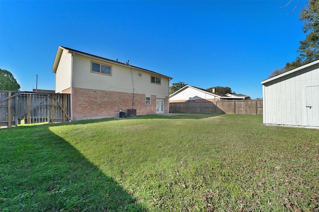 view of yard with central AC