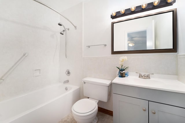 full bathroom featuring vanity, toilet, and tiled shower / bath