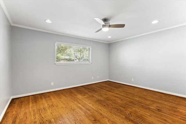 spare room with crown molding, hardwood / wood-style floors, and ceiling fan