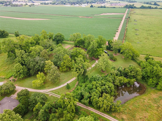 aerial view featuring a rural view and a water view