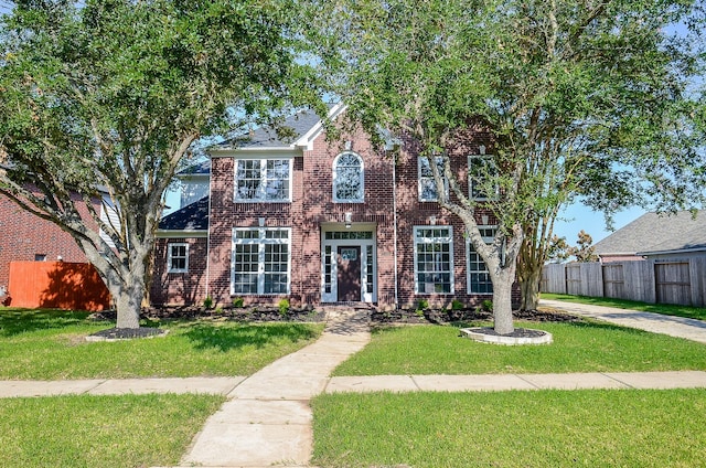 view of front of home with a front lawn