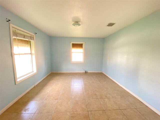 view of tiled spare room