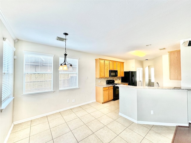 kitchen featuring pendant lighting, black appliances, light tile patterned floors, tasteful backsplash, and kitchen peninsula