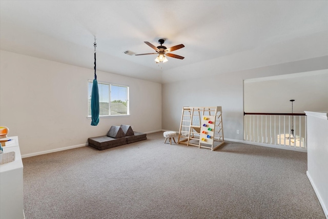 recreation room featuring carpet flooring and ceiling fan