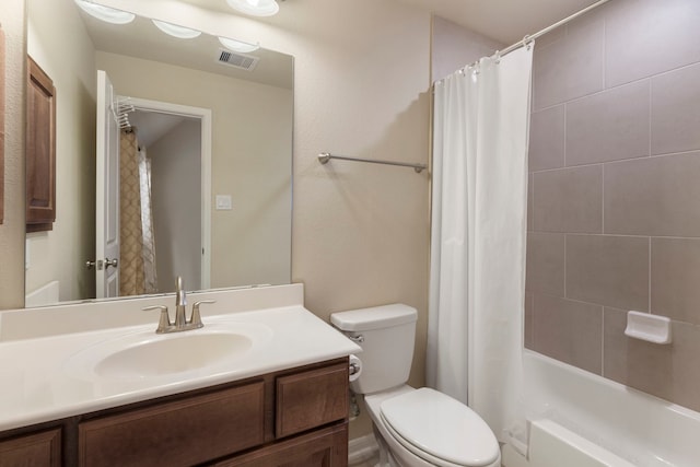 full bathroom with shower / bathtub combination with curtain, vanity, and toilet