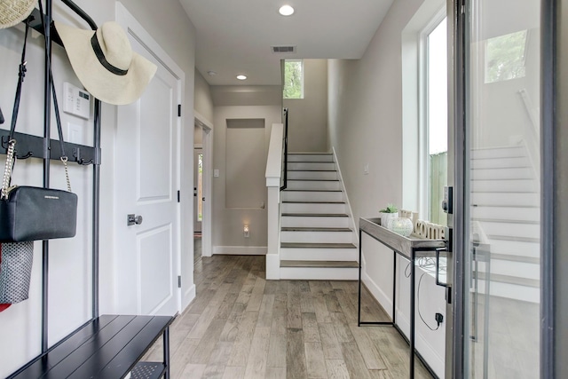 entrance foyer with light hardwood / wood-style floors