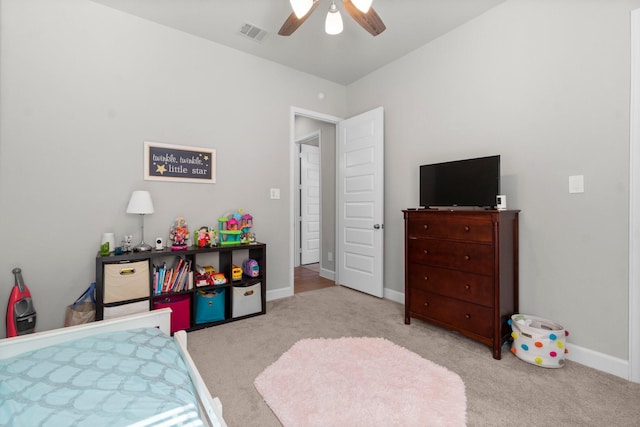 carpeted bedroom with ceiling fan