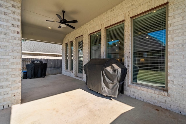 view of patio / terrace with ceiling fan and grilling area