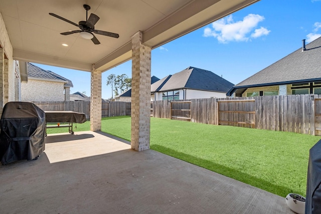 view of patio / terrace featuring ceiling fan and grilling area